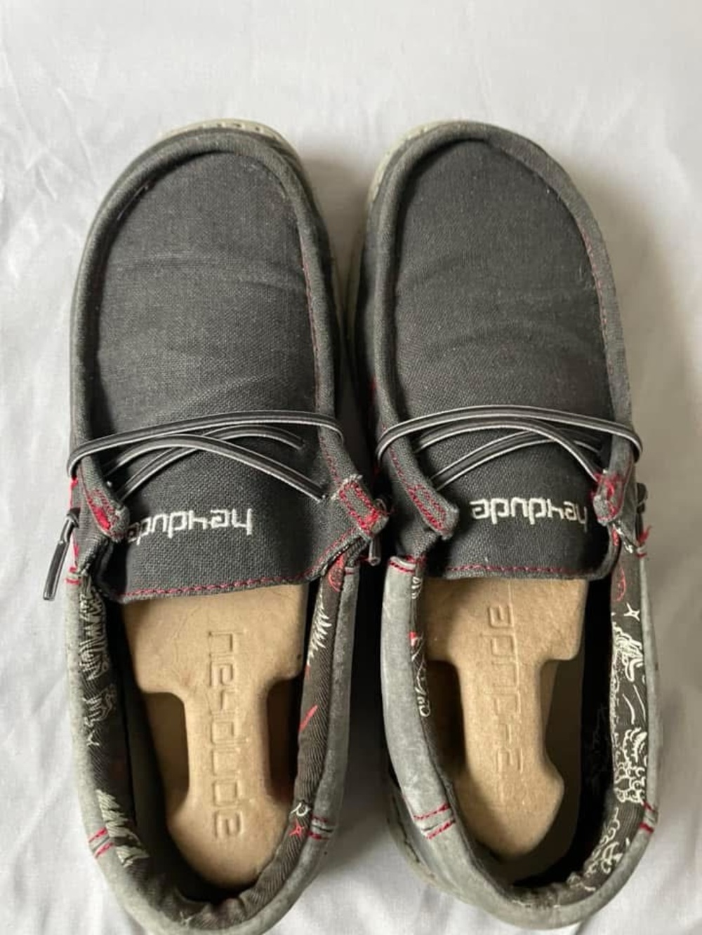 Hey Dude Men's Slip-On Loafers in Black with Red Accents